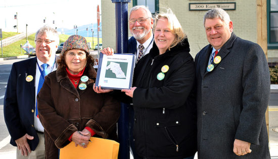 Clinton County Commissioners Paul Conklin, Pete Smeltz, and Jeff Snyder pose with Fair Districts PA coordinators Rose Reeder and Pattie O’Neill. (Courtesy Sarah Smeltz/The Express)